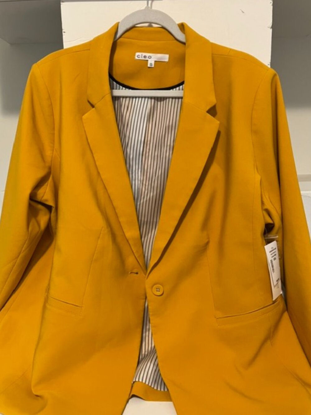 Cleo bright yellow blazer.